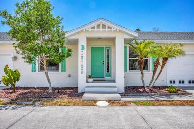 Unit B Entrance with garage attached on right | Image 1