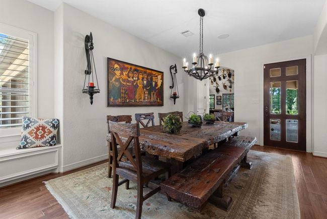The breakfast room is larger than most formal dining areas and is open to the kitchen and den...... | Image 22