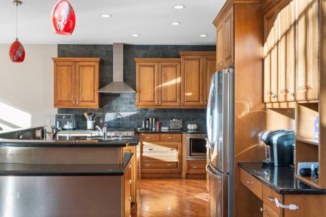 75 Hamptons Close Nw, Home with 5 bedrooms, 3 bathrooms and 4 parking in Calgary AB | Image 14