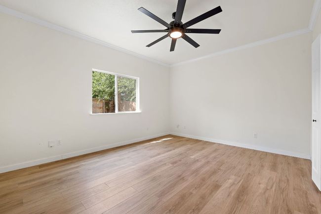 Master bedroom, located downstairs | Image 16