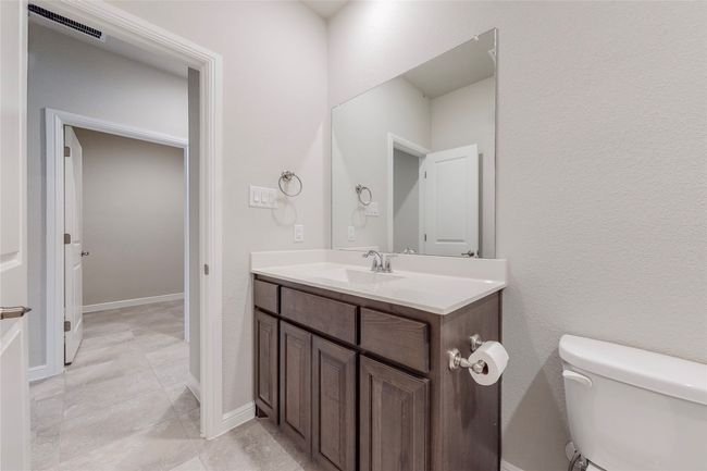 Bathroom featuring vanity and toilet | Image 20