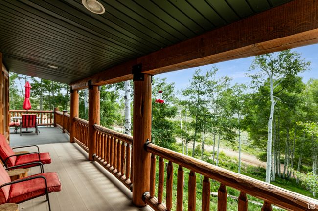 Wooden terrace with view of scattered trees | Image 7