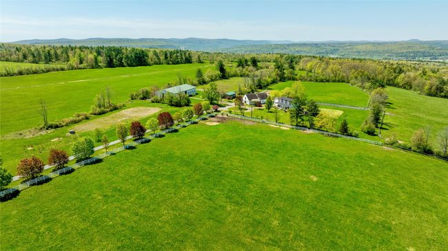 View of rural area with a mountainous background and a pastoral area | Image 27