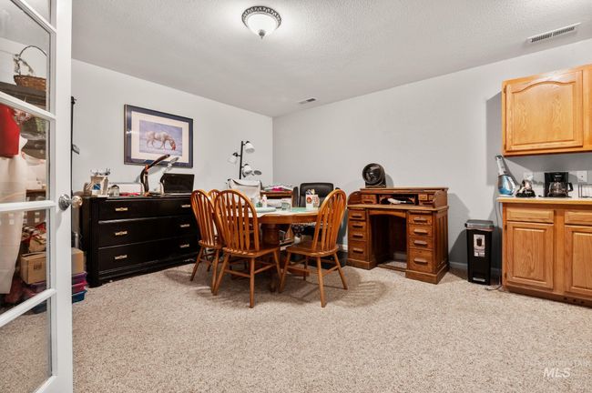Bonus room with French doors entry, light carpet, cabinets & sink | Image 32