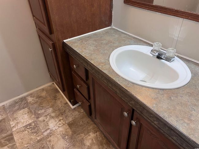 Bathroom with vanity and baseboards | Image 10