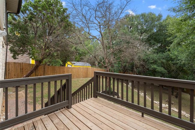 Deck featuring a fenced backyard and a yard | Image 33