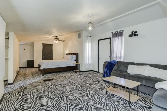 3rd level isolated bedroom & bath with video projector and access to outdoor patio. | Image 41