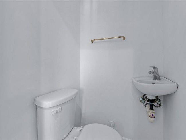 Bathroom featuring toilet | Image 12