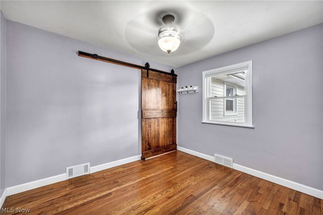 Unfurnished bedroom featuring carpet flooring, ornamental molding, and a closet | Image 17