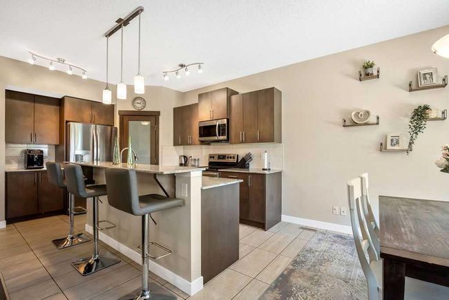 5 Drake Landing Loop, House detached with 3 bedrooms, 2 bathrooms and 5 parking in Okotoks AB | Image 8