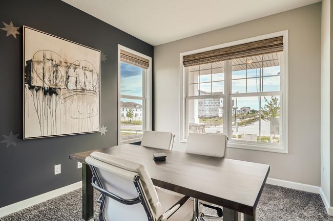 Photo is of the model. The home features a main level study. Perfect for those working from home or who want an office space to stay organized. | Image 10