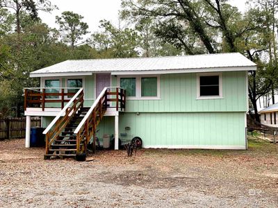 1004 E 23rd Avenue, Home with 5 bedrooms, 4 bathrooms and null parking in Gulf Shores AL | Image 1