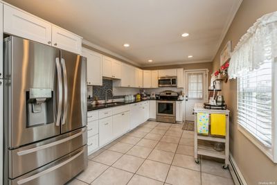 30 James Lane, House other with 4 bedrooms, 1 bathrooms and null parking in Levittown NY | Image 3