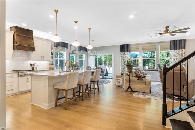 Open concept living takes in the water views. | Image 7