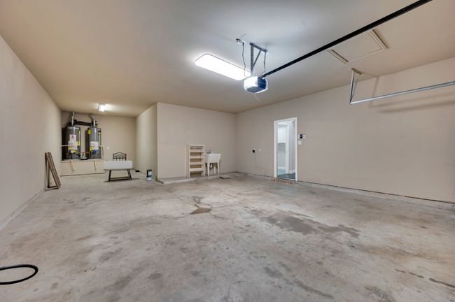 Tandem garage with parking for 3 cars! | Image 29