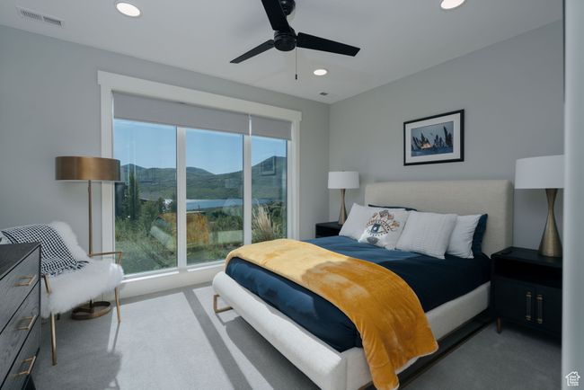 Carpeted bedroom featuring recessed lighting, a mountain view, and a ceiling fan | Image 36