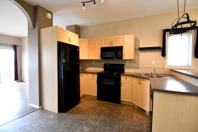 49 Prairie Ridge Close, Townhouse with 2 bedrooms, 2 bathrooms and 3 parking in Blackfalds AB | Image 12