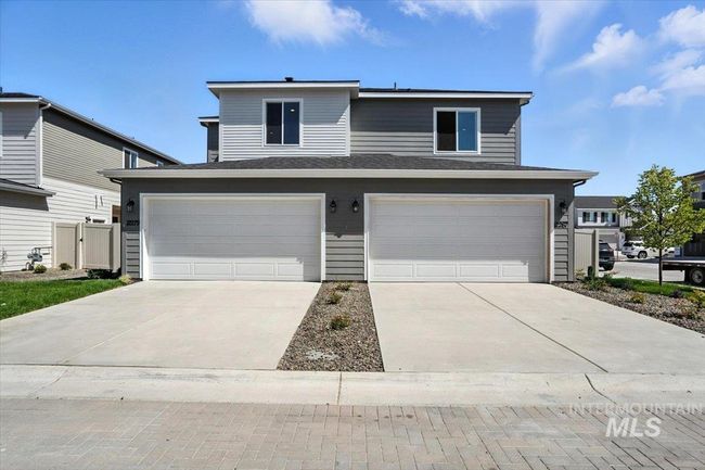 View of front of home featuring driveway and an attached garage | Image 28
