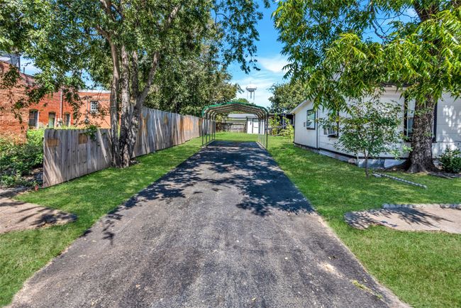View of asphalt driveway | Image 7