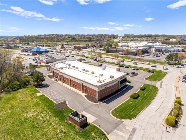 Back of building with separate entrance and additional parking | Image 49