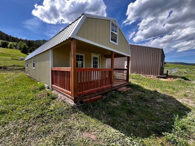 Rear view of property with metal roof | Image 36
