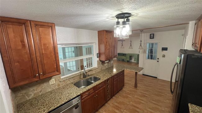 7730 Broken Arrow Trl, House other with 3 bedrooms, 2 bathrooms and null parking in WINTER PARK FL | Image 12