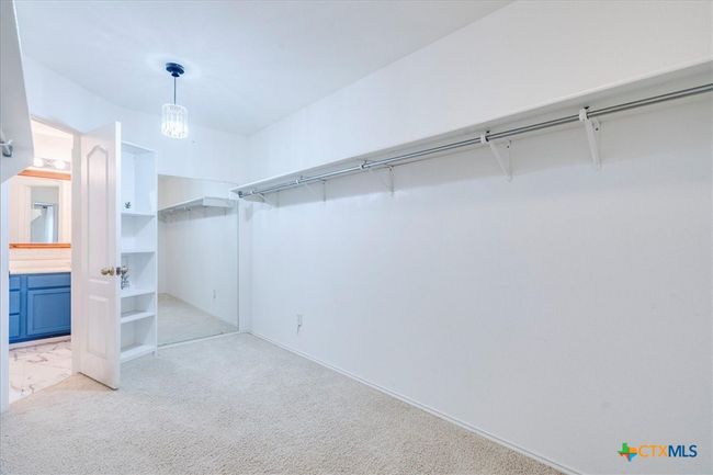 Giant walk in primary closet | Image 19