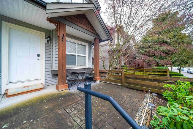 Property entrance with a porch and fence | Image 5