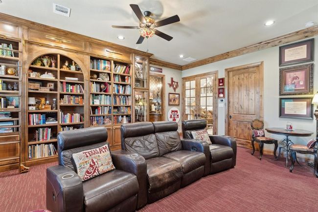 Illuminating the Library Wall are three 18" antique brass "Cabinet Maker'sPicture Lights. | Image 17