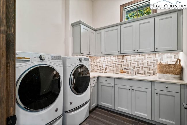 Photo is of a similar model - 2005 is not currently complete- laundry room layout, color scheme, finishes and fixtures subject to change during construction | Image 11