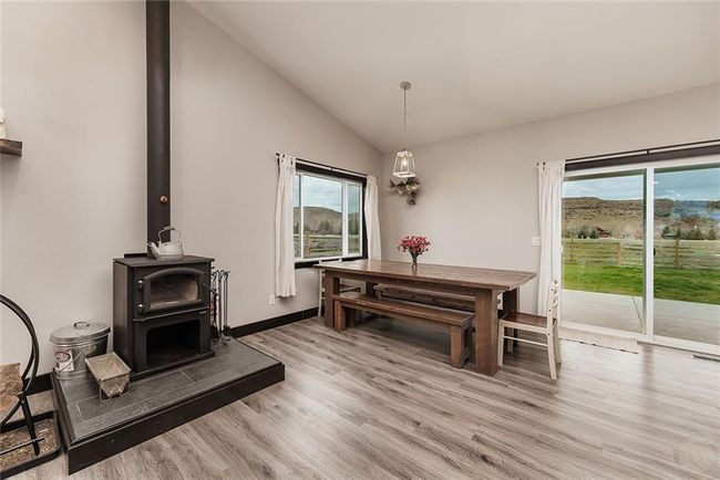 Wood Stove and dining. EX cleanability w/ LVP flooring | Image 6
