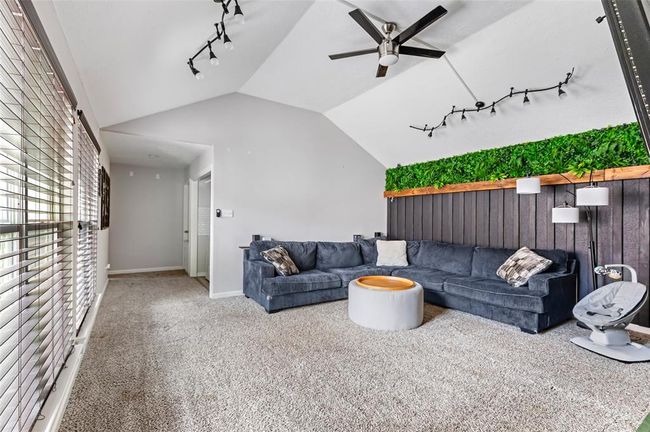 BEAUTIFUL FAMILY ROOM ! It features ceiling fan and track lighting. | Image 5