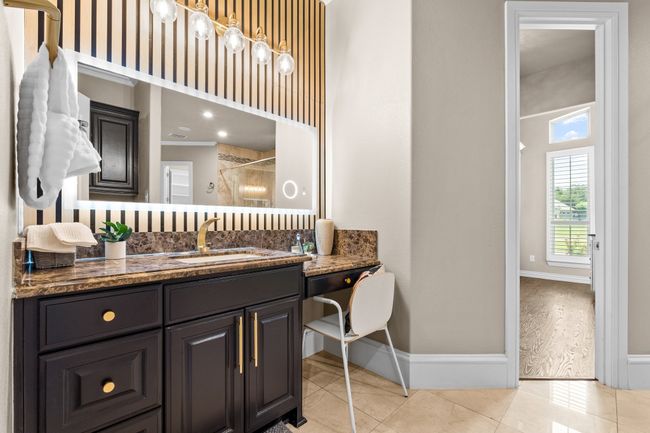 Full bathroom with vanity, tiled shower, and tile patterned flooring | Image 16