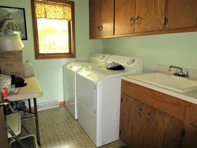 Main Floor Laundry Room With Sink | Image 52
