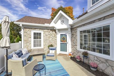 View of patio with outdoor lounge area | Image 2