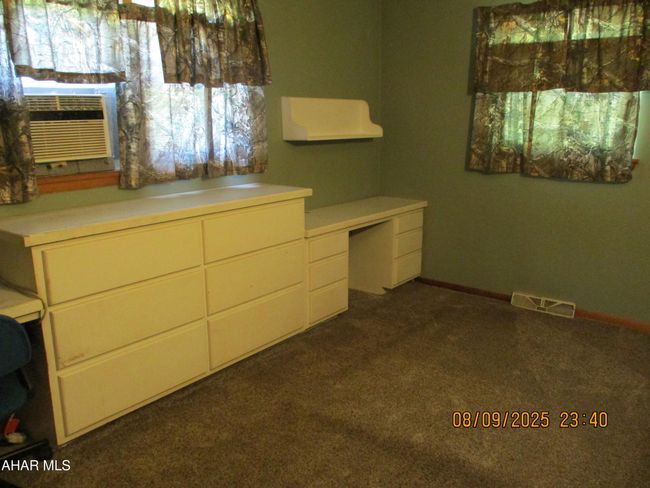 Second bedroom with built ins. | Image 11