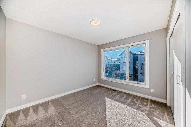 207 Evanscrest Square Nw, Townhouse with 2 bedrooms, 3 bathrooms and 1 parking in Calgary AB | Image 18