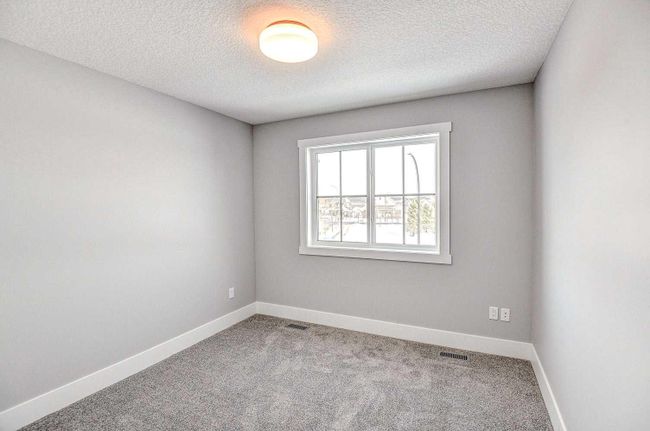 1209 Coopers Drive Sw, Home with 4 bedrooms, 2 bathrooms and 3 parking in Airdrie AB | Image 37