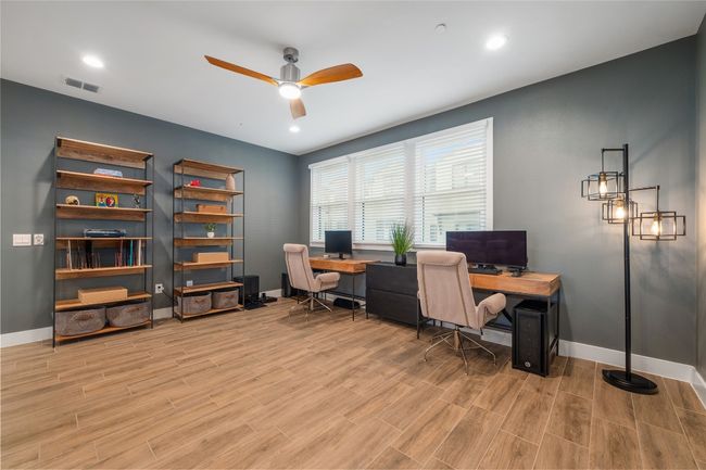 Office nook owner created in family room. | Image 21