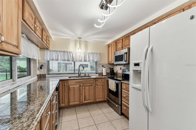 12101 Meadowbrook Ln, House other with 3 bedrooms, 2 bathrooms and null parking in Bayonet Point FL | Image 26