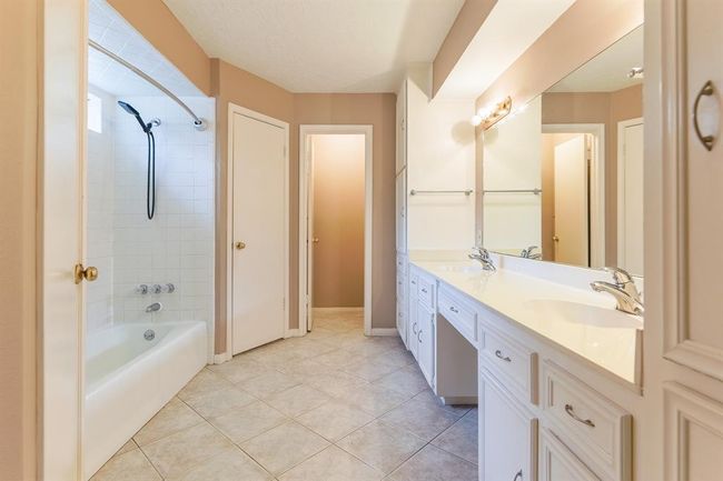 Large Primary bath with his and hers closets | Image 17
