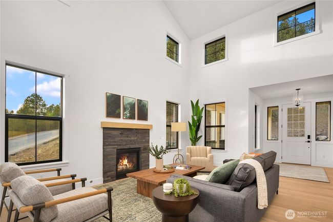 As the newest PNW master-planned community, enjoy 200+ acres of open space, trails & the Coal Trax Mt Bike Park. Soaring ceilings in the great roommake each day worthy of celebration & open floorplan appeals to entertaining. Covered deck & patio. Southern-facing homesites range from the mid600s- 900ks. Enjoy a variety of innovative & distinctive new home options with the best all-season recreation just moments away! Built for the future, indulge in a retreat just 90-min to Seattle. Plans and elevations are artist’s renderings only, may not accurately represent the actual condition of a home asconstructed and may also contain options and upgrades which are not included in the sale. Trailside Homes reserves the right to make changes to the floorplan, specifications, dimensions, design and elevations without prior notice. Stated dimensions and square footage are estimated and should not be usedas representations of the home’s actual size. | Image 22