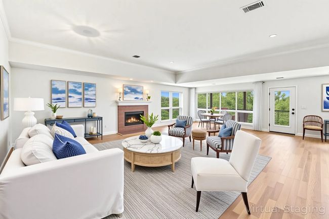 Virtually staged Living area is open to a seating area with views | Image 5