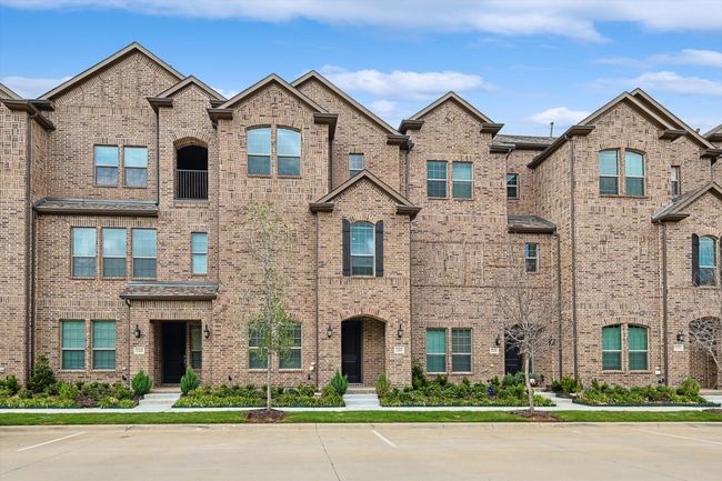 View of front of house featuring uncovered parking and brick siding | Image 28
