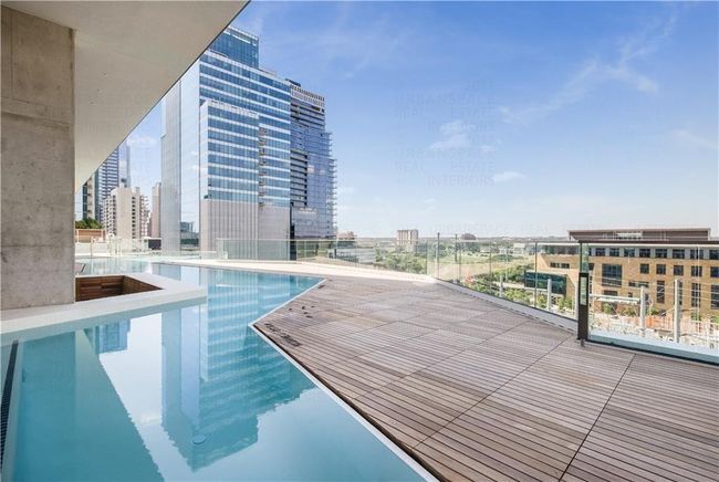 View of pool featuring a view of city | Image 13