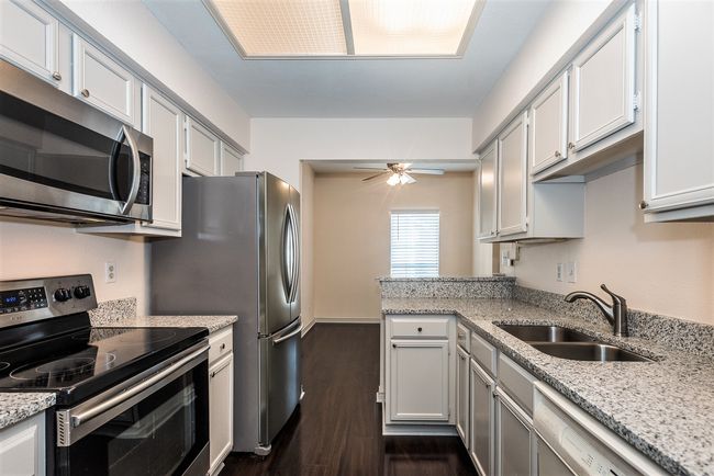 Kitchen includes Stainless Refrigerator & Appliances | Image 10