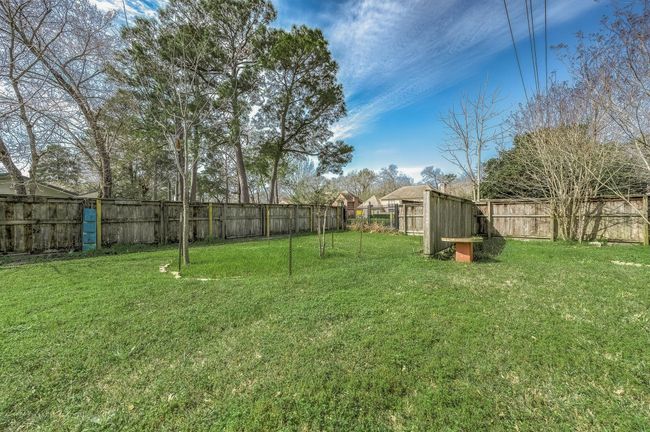 Double fenced back yard with no back or side neighbors! | Image 38