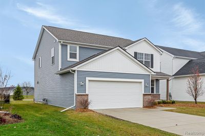 130 Sawgrass Drive, Home with 4 bedrooms, 2 bathrooms and null parking in Marion Twp MI | Image 2