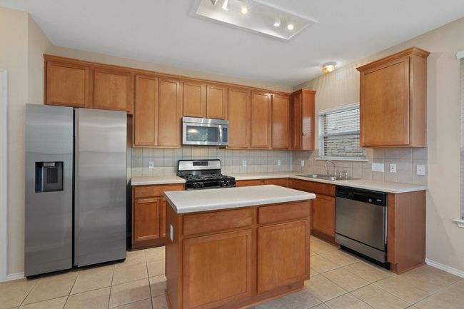 Kitchen featuring stainless steel appliances | Image 10
