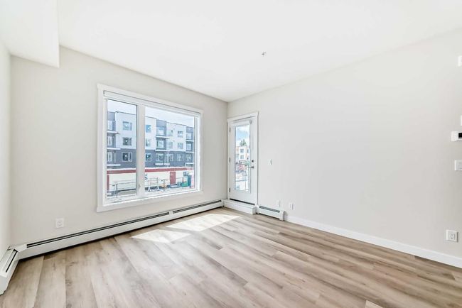 212 - 660 Shawnee Square Sw, Condo with 2 bedrooms, 2 bathrooms and 1 parking in Calgary AB | Image 12